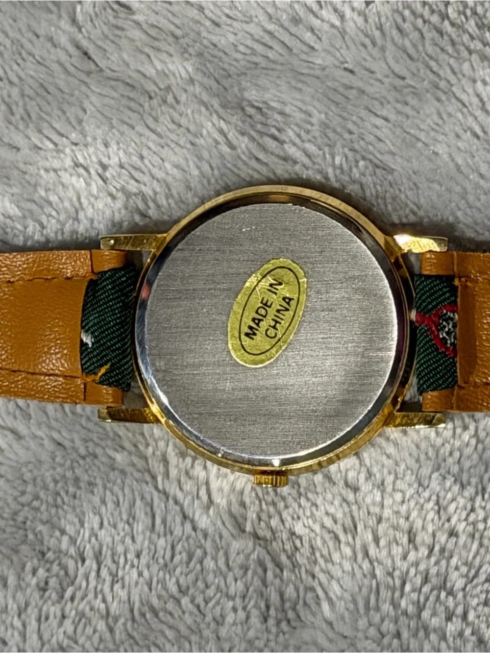Tennis Motif Gold-Tone Watch with Green Dial Accents
